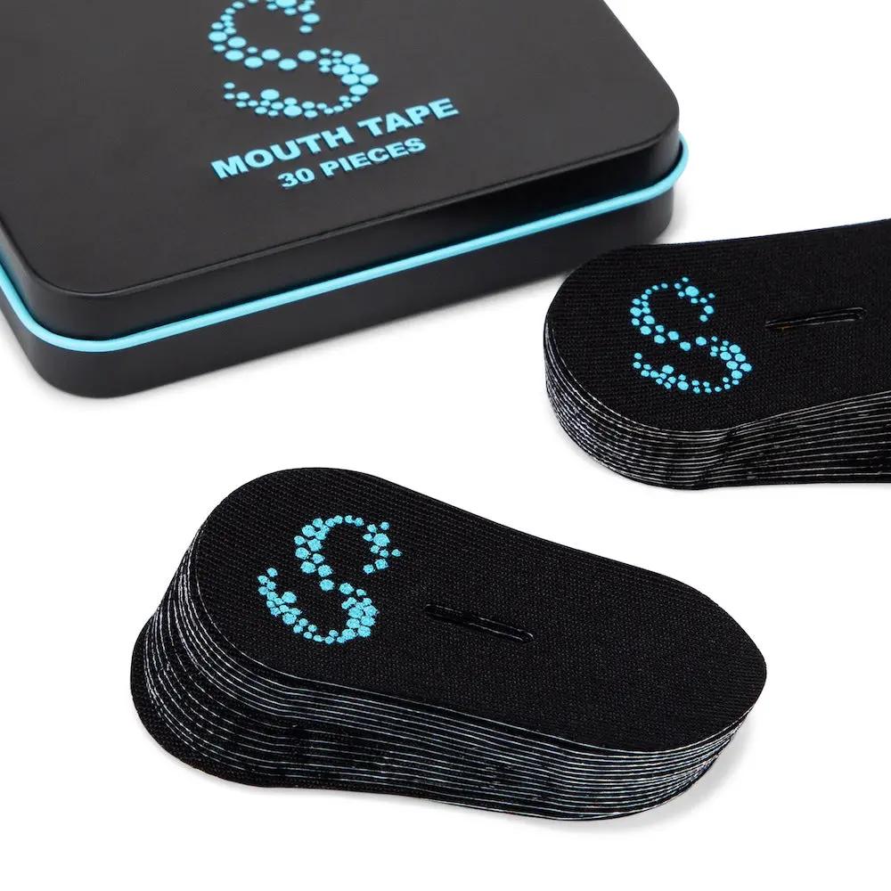 Nasal breathing mouth tape- Black product packaging box displayed open with mouth tape inside.